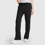 A person wears Champion Lightweight Lounge Pants, featuring a drawstring waist and the brand’s signature C logo on the left thigh; they pair them with white sneakers.