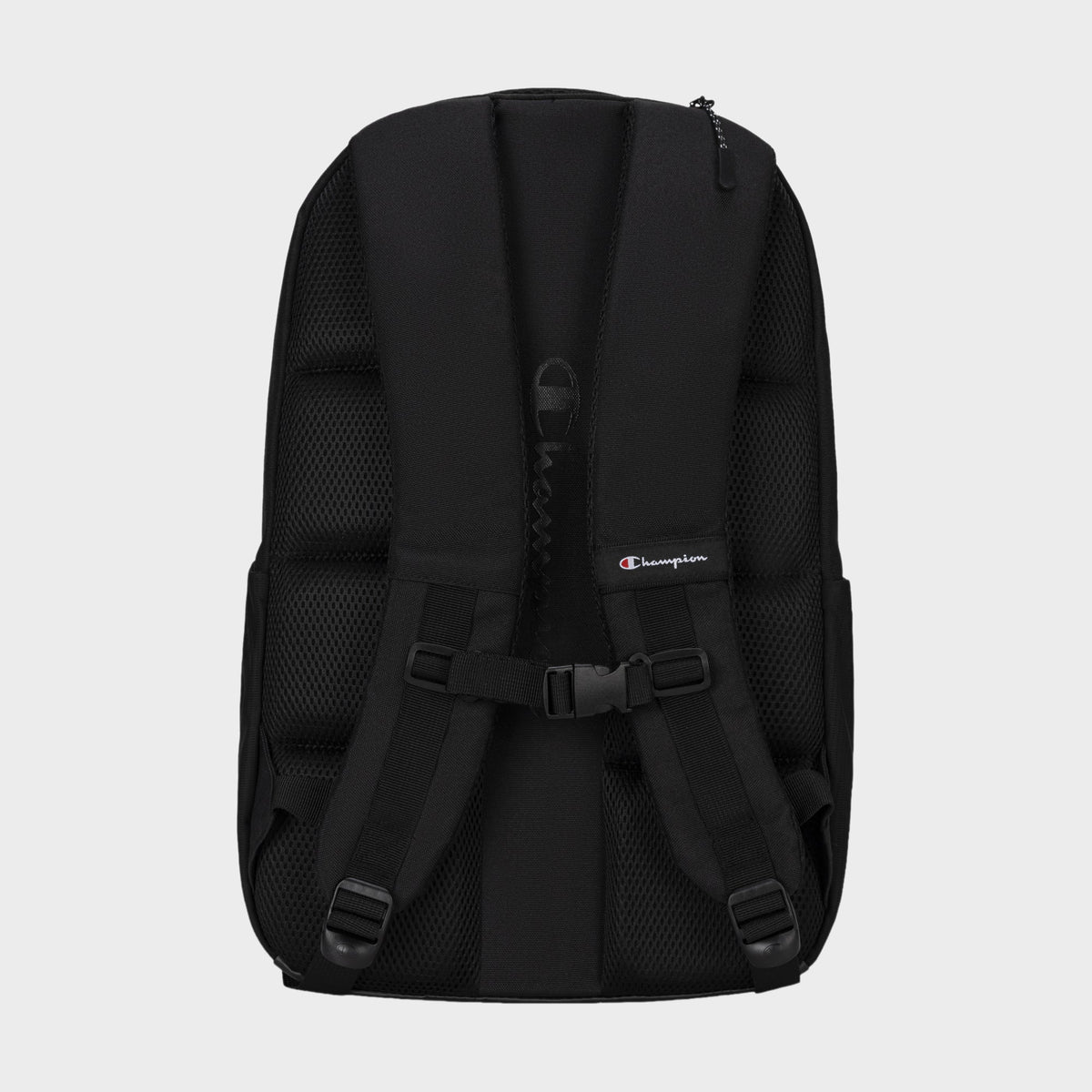 The Champion Summit Backpack is displayed from the back against a plain light gray background, highlighting its contoured strap system with padded, adjustable shoulder straps, a chest buckle, and mesh padding. One strap features a small Champion logo tag. Designed for functionality, the Summit Backpack also includes a padded laptop sleeve to keep your device secure.