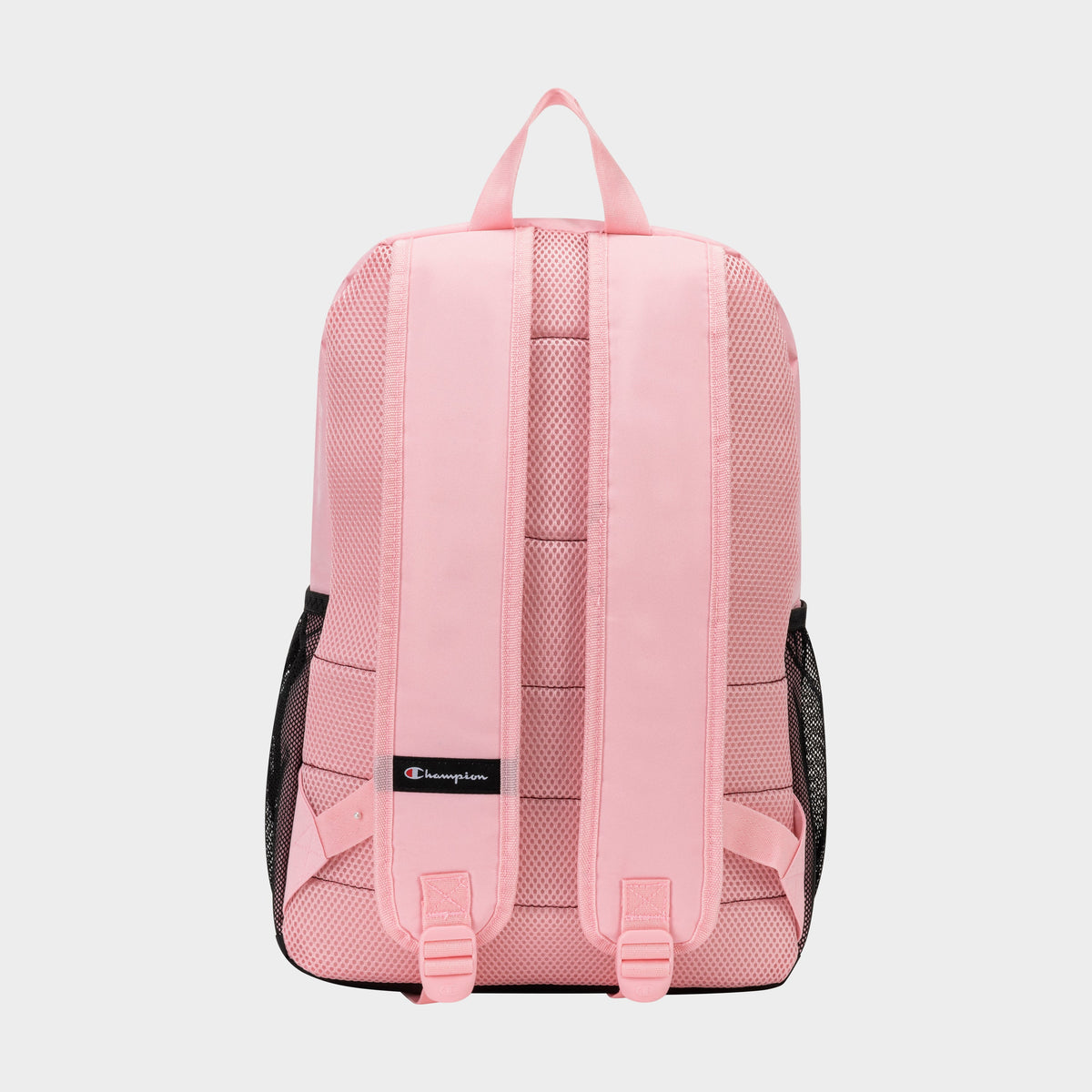 The Champion Luna Backpack is a pink minimalist bag featuring mesh side pockets, padded shoulder straps, and a small Champion logo tag near the bottom. Designed for everyday use, this backpack is displayed from the back against a plain white background.