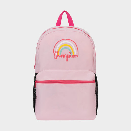 The Champion Kids' Merit Backpack is a light pink polyester bag with a front pocket, black mesh side pockets, pink handle and zipper pulls, and a rainbow graphic above "champion" on the front—ideal for young athletes.