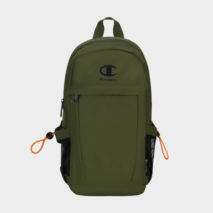 The Champion Camden Sling backpack, shown in olive green with a black logo, features front zip pocket, side mesh pockets, and orange zipper pulls. Made from durable nylon material, this sling bag includes an adjustable strap for comfortable carrying and is displayed on a plain light background.