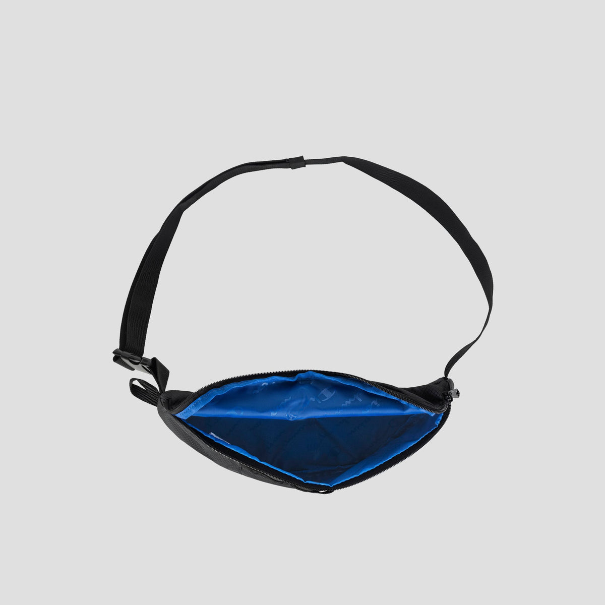 A black Champion Document Waist Pack with an adjustable strap is shown open, revealing its blue interior lining, against a plain light gray background—perfect for organization on the go.