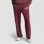 Champion Mineral Wash Open Hem Pant in deep red with a vintage look, wide hem, and a white logo on the left thigh.