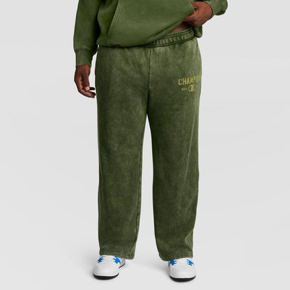 Olive green Mineral Wash Open Hem Pant by Champion with an open hem and a logo on the left thigh.