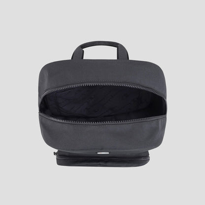 A Champion Level Backpack is displayed from a top-down perspective with the main zipper compartment open, showcasing its fabric-lined interior and a small handle at the top. Ideal for everyday use, this durable Level Backpack by Champion is photographed against a simple light gray background.