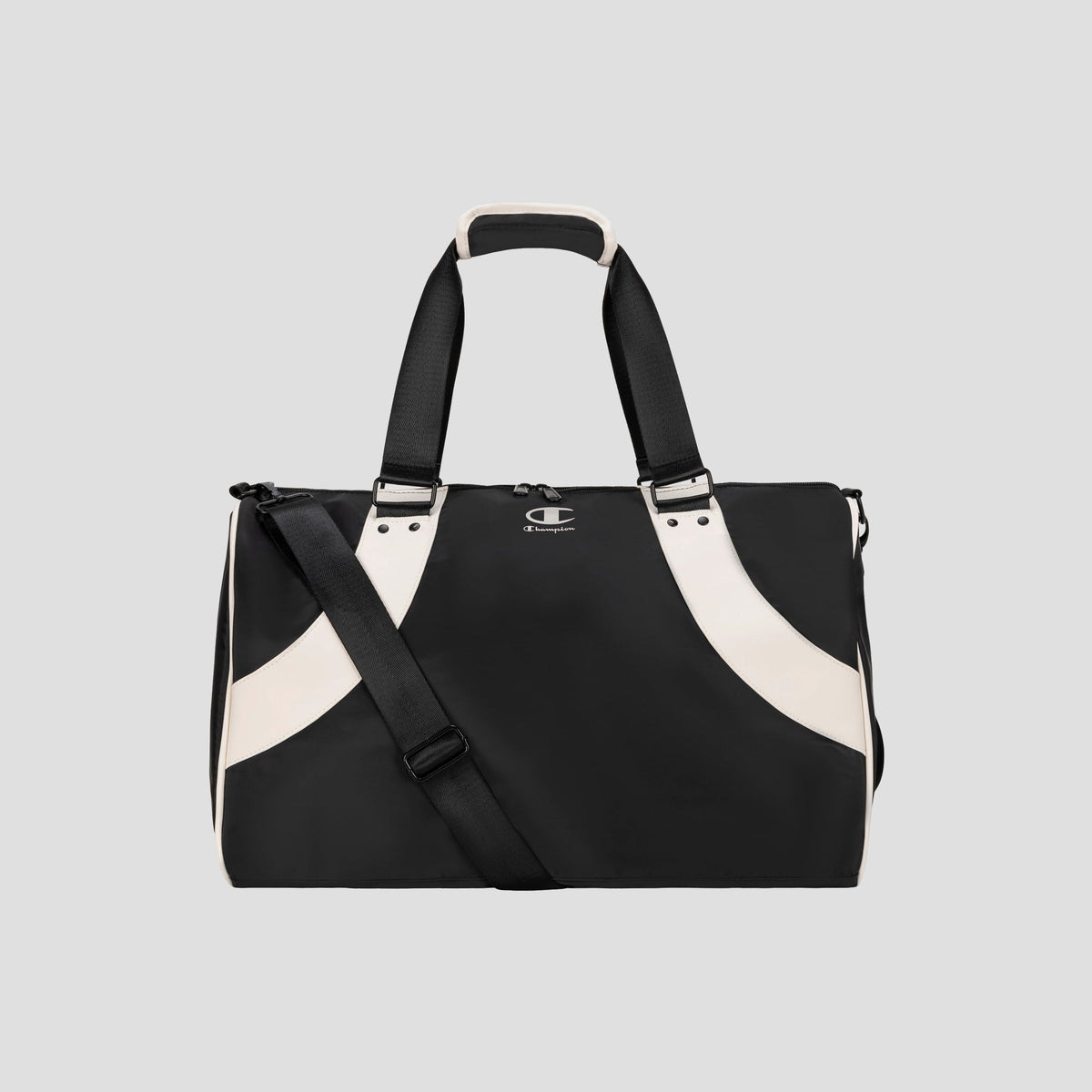 Black and white Oracle Duffel Bag by Champion with top handles and a detachable shoulder strap, displayed against a plain gray background. This versatile gym bag features a small Champion logo on the front.