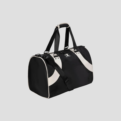The Oracle Duffel Bag by Champion is a sleek black sports bag with white accents, featuring both a shoulder strap and handles. Set against a gray background, this stylish duffel displays the iconic Champion logo on the side, making it ideal for gym sessions or travel.
