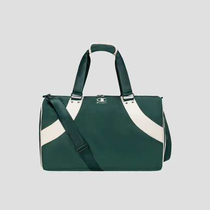 The Champion Oracle Duffel Bag is a green sports travel bag featuring white diagonal stripes, a top handle, a shoulder strap, and a small Champion logo on the front, displayed against a plain light gray background.