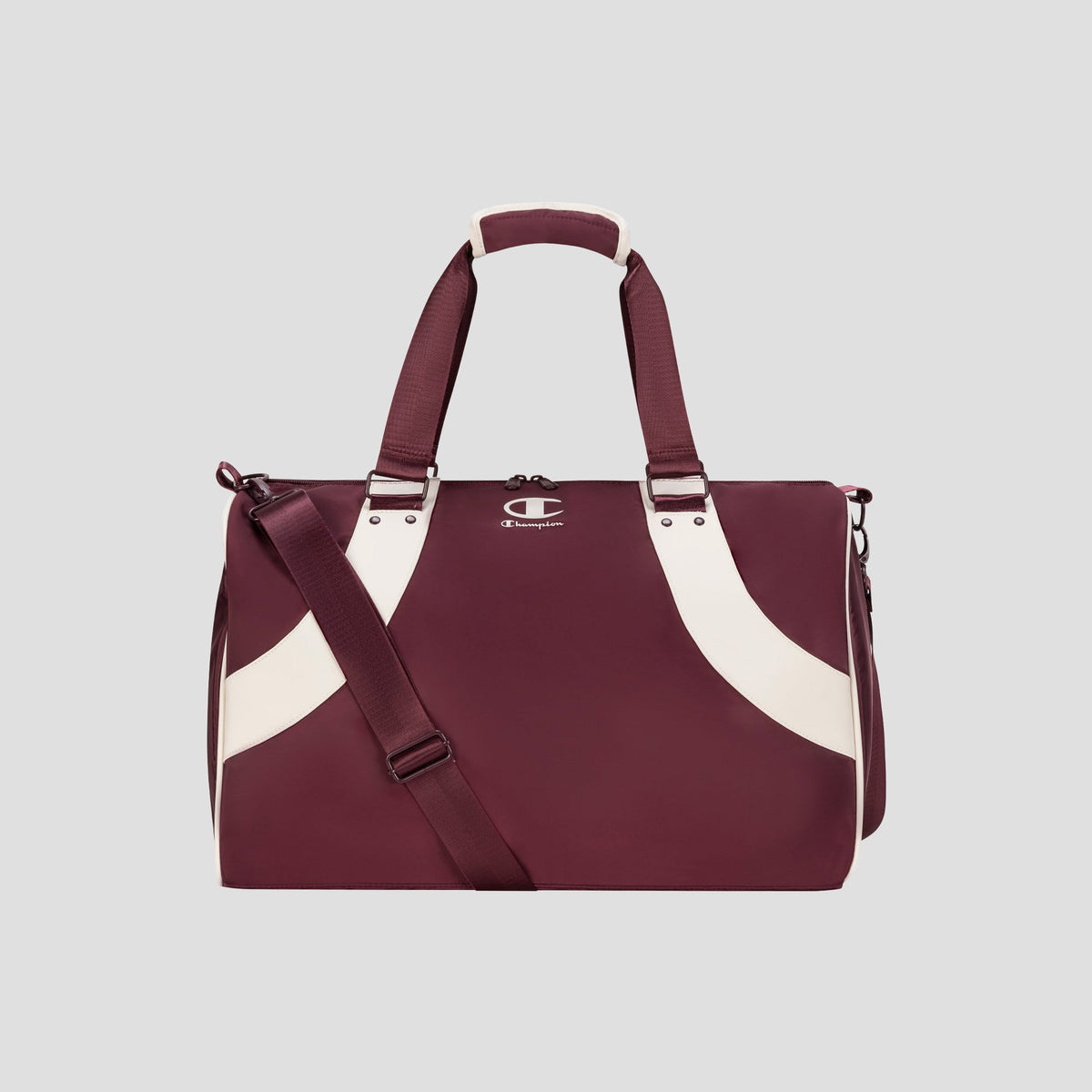 The Champion Oracle Duffel Bag in maroon, featuring white curved stripes, top handles, a shoulder strap, and a small Champion logo on the front, is displayed against a plain light gray background. This versatile gym bag is ideal for both workout sessions and travel.