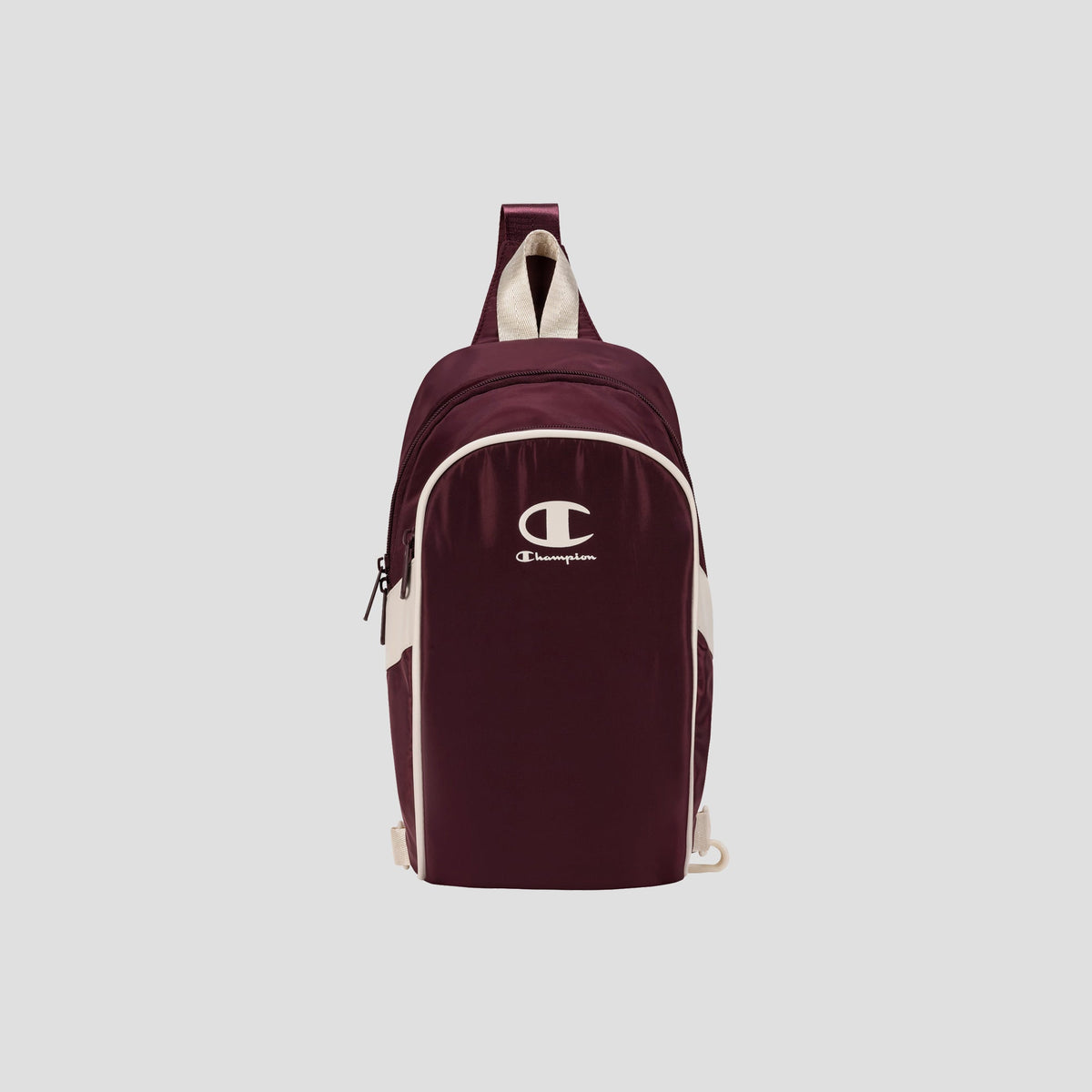 Oracle Sling Pack by Champion in maroon with white logo and accents, featuring a single shoulder strap and front zipper pocket, displayed on a plain light background—the perfect crossbody bag for the gym or everyday use.