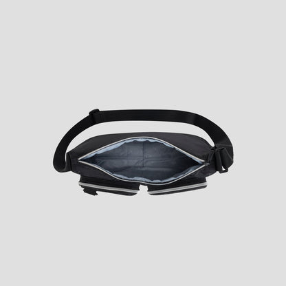 A top view of the Champion Quartz Small Messenger Bag, shown open with a padded gray interior and adjustable strap, displayed on a light gray background.