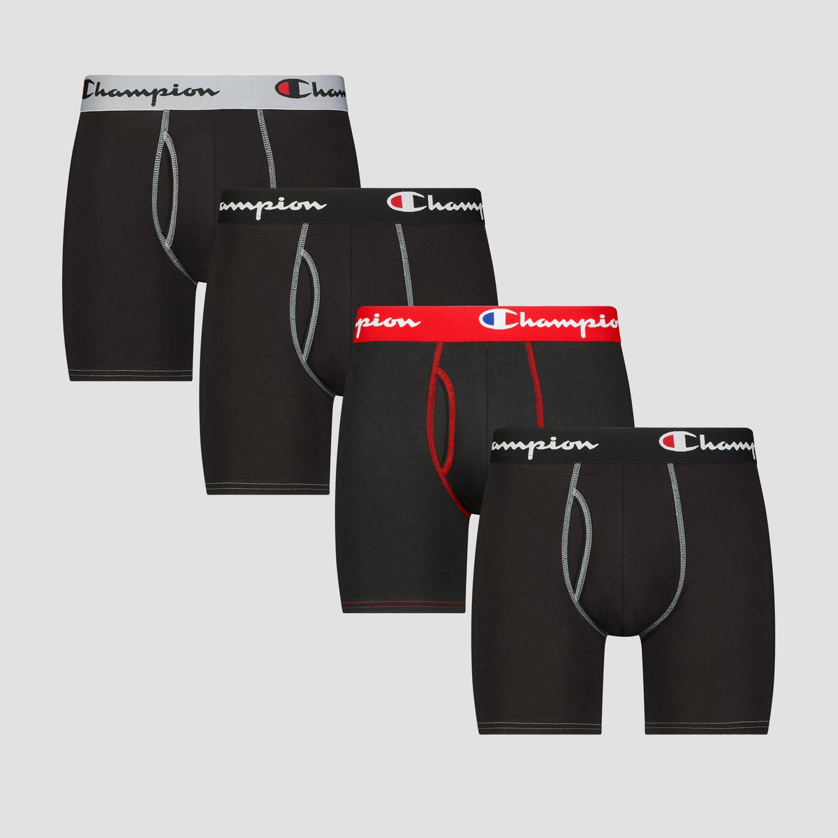 The Champion 4Pk Cotton Stretch Boxer Brief set includes four black pairs, each with a different colored waistband—white, gray, red, or blue—and the Champion logo. Made from cotton stretch fabric for comfort.