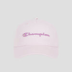 A light pink Champion Script Embroidery Adjustable Cap is shown against a plain gray background, featuring stylish script embroidery of the word “Champion” in purple and pink thread on the front for a sporty yet chic look.