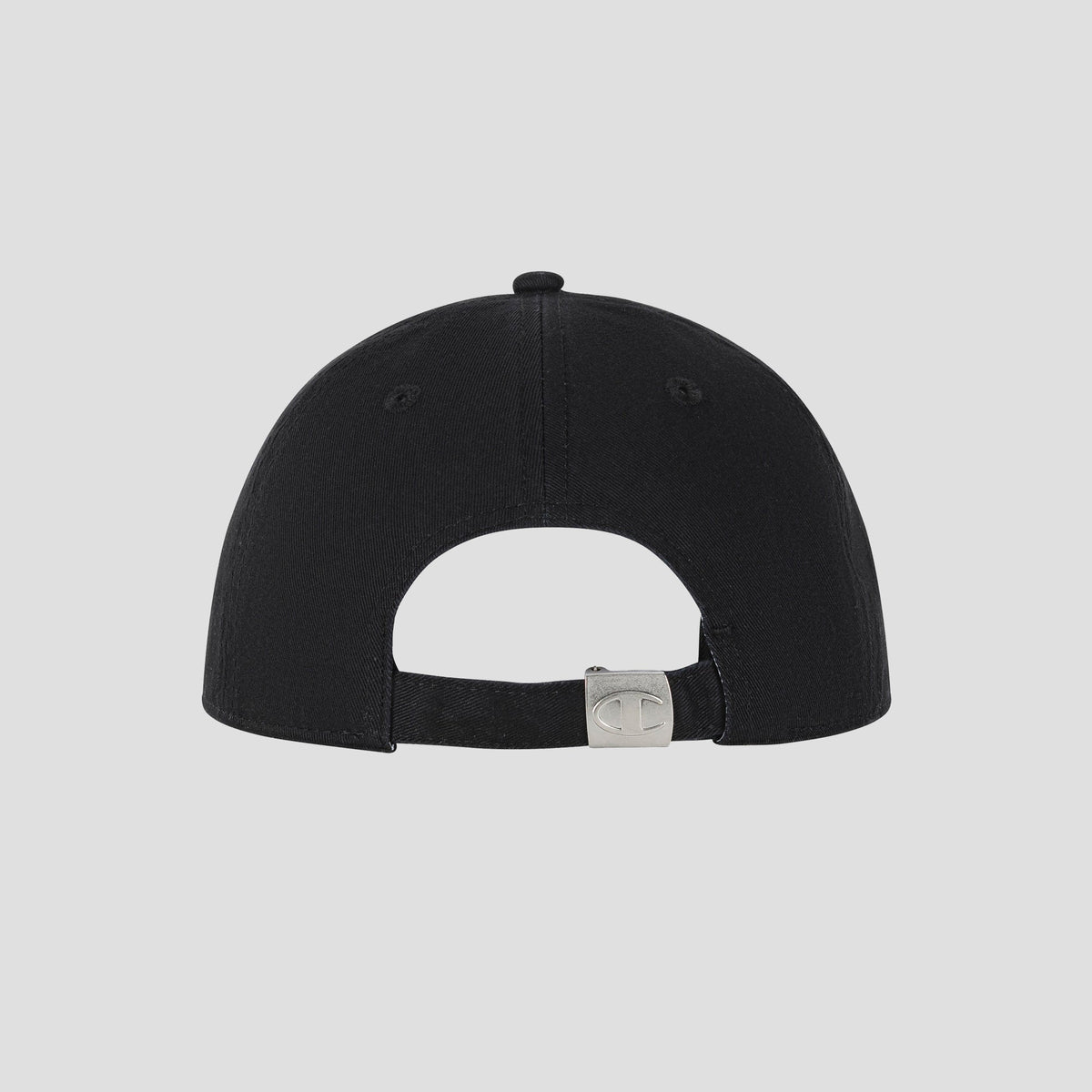 Back view of the Champion Script Embroidery Adjustable Cap in black, crafted from washed cotton twill with an adjustable strap and metallic clasp, featuring a small engraved logo. The background is plain and light gray.