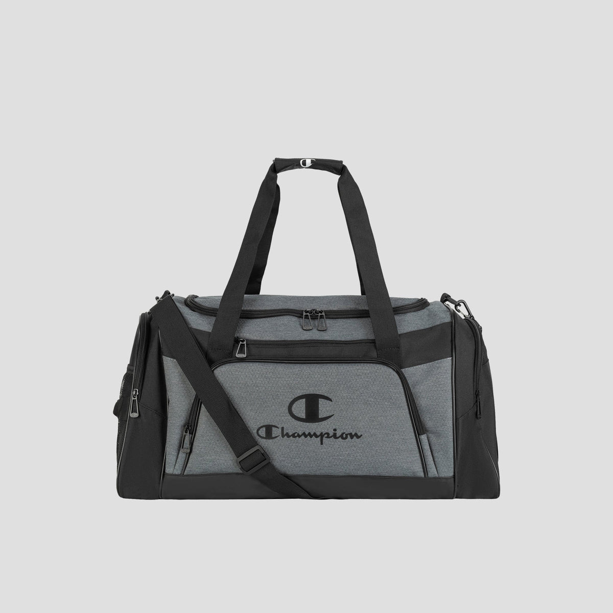 Introducing the Champion Stadium Duffel Bag in gray and black, featuring sturdy black handles, a convenient shoulder strap, and the iconic Champion logo on the front set against a light gray background—making it the perfect choice for your go-to gym bag.