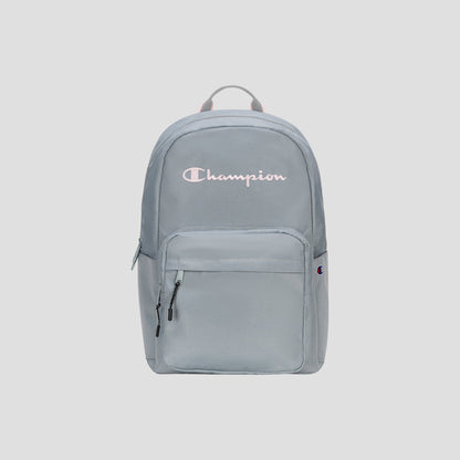 Introducing the Steady Backpack from Champion: this light gray bag features a front zip pocket, dual zipper pulls, and the Champion logo in white and pink displayed across the upper front. Designed with a fabric top handle and a streamlined, minimalist look, it’s perfect for carrying all your essentials in style.