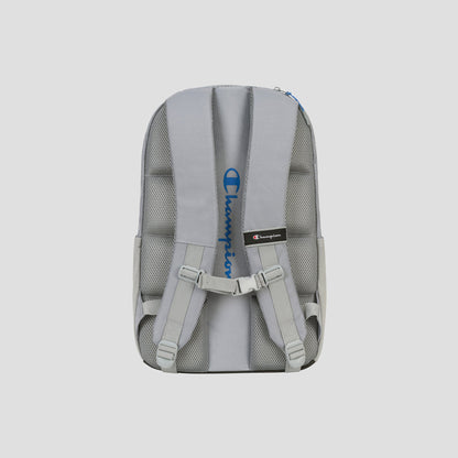 The Summit Backpack by Champion is shown from the back, featuring padded shoulder straps, an adjustable chest strap, mesh padding, and the blue Champion logo vertically positioned between the straps. This weather-resistant design also includes a padded laptop sleeve for added protection and convenience.