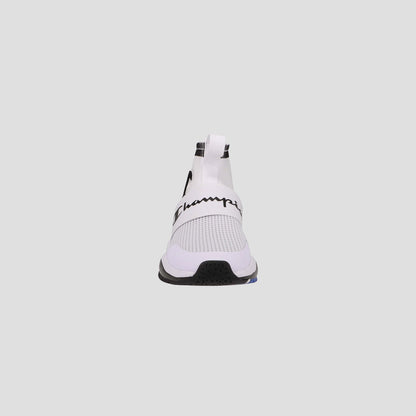 The Champion Kids' Rally Pro shoe is a stylish, comfortable slip-on with a white mesh upper, black outsole, and a "Champion" strap across the top—perfect for kids and easy to wear.