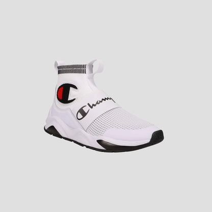 The Champion Kids' Rally Pro is a white athletic high-top sneaker with a black sole, black and red logo on the side, "champion" across the foot, and a knit sock-like collar with pull tab for easy wear.