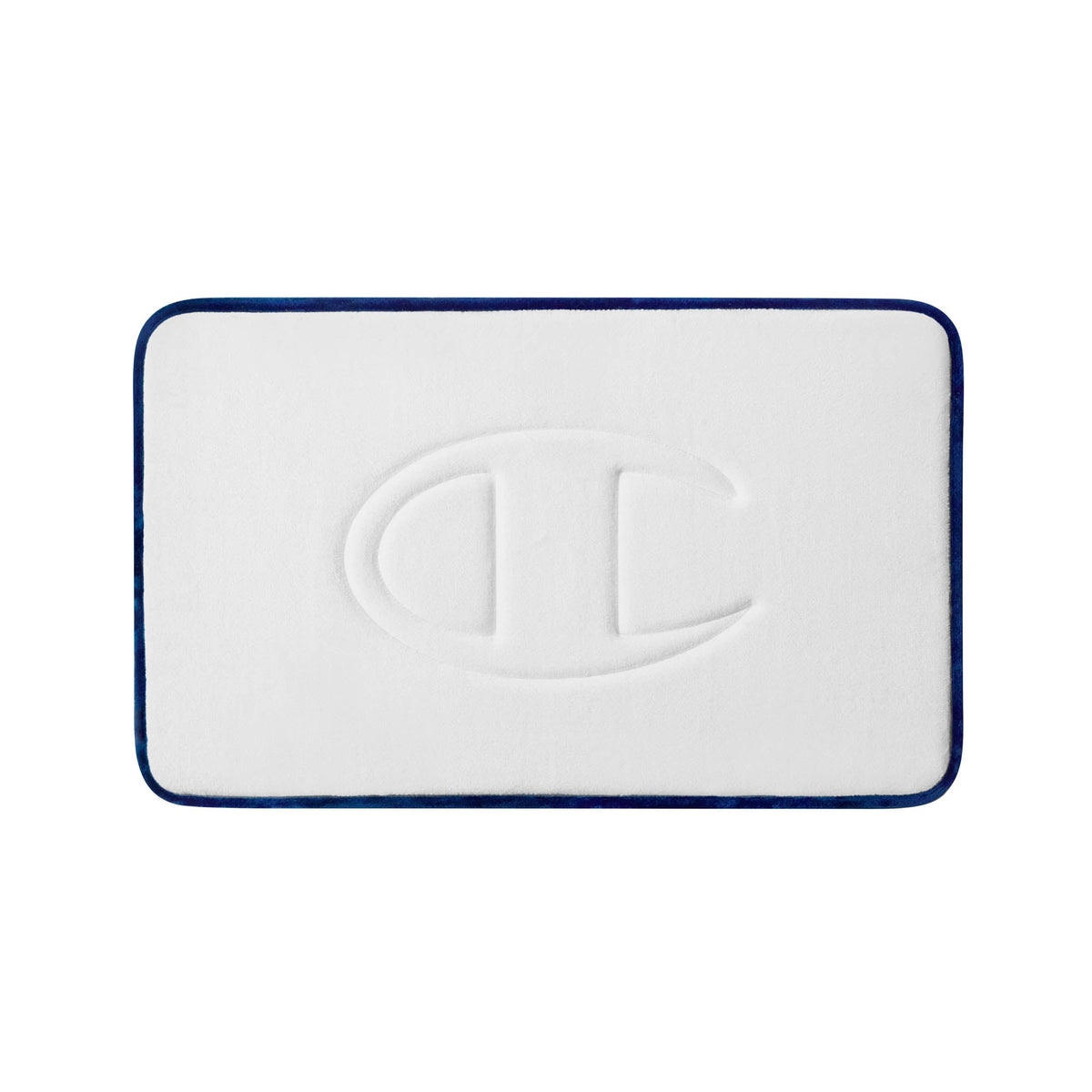 Introducing the Champion Quilted Logo Memory Foam Bath Mat: a white rectangular bath mat with a cushioned memory foam design, featuring a raised Champion “C” logo in the center and a dark blue border—perfect for adding both comfort and style to your bathroom.